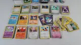Grote Pokémon-verzameling met kaarten, Pikachu en accessoires – foto 3 – kavel bij De Kringwinkel, Turnhout