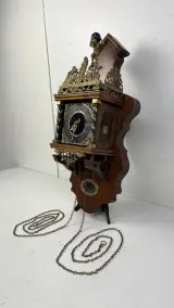 Zaanse wandklok Warmink Wuba mechanisch met Atlasfiguur en ruiterslinger – foto 3 – kavel bij De Kringwinkel, Waardamme