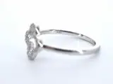 Witgouden ring met een open klaver vier motief gezet met diamanten – foto 7 – kavel bij Onlineveilingmeester
