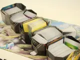Groot Pokémon verzamel lot – TCG kaarten, tins, Pikachu knuffel, DVD’s, Pokémon GO & accessoires – foto 8 – kavel bij De Kringwinkel, Antwerpen
