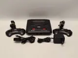 SEGA Mega Drive II - spelconsole met 2 controllers - in de originele doos – foto 2 – kavel bij De Kringwinkel, Gent