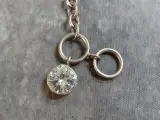 Zilveren schakelarmband met hartenbedel en zirkonia details – foto 4 – kavel bij De Kringwinkel, Gent