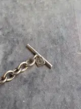 Zilveren schakelarmband met hartenbedel en zirkonia details – foto 7 – kavel bij De Kringwinkel, Gent