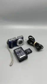 Digitale compactcamera Panasonic Lumix DMC-TZ5 met Leica 10x zoom en accessoires – foto 6 – kavel bij De Kringwinkel, Oostkamp