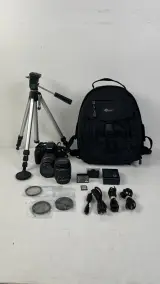 Spiegelreflexcamera Canon EOS 1300D set met twee lenzen statief en rugzak – foto 2 – kavel bij De Kringwinkel, Oostkamp