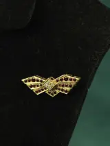 Parelketting met 18k gouden broche-hanger, diamant en robijnen – foto 8 – kavel bij De Kringwinkel, Antwerpen