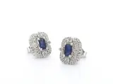 Witgouden design oorbellen met diamanten en saffier – kavel bij Onlineveilingmeester