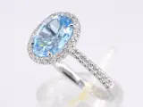 Witgouden entourage ring met ovaal geslepen topaas – foto 4 – kavel bij Onlineveilingmeester