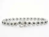 Witgouden armband met diamanten en briljanten 5.80 carat – foto 3 – kavel bij Onlineveilingmeester