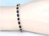 Gouden tennisarmband met diamanten en saffier – foto 2 – kavel bij Onlineveilingmeester