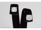 Witgouden oorbellen met twee solitaire diamanten van 2.00 carat totaal – kavel bij Onlineveilingmeester