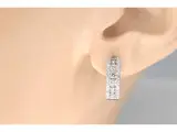 Witgouden oorbellen met drie rijen diamanten – foto 2 – kavel bij Onlineveilingmeester