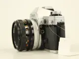 Canon AE-1 + 50 mm Canon s.c. 1:1.8 lens – foto 3 – kavel bij De Kringwinkel, Antwerpen