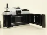 Canon AE-1 + 50 mm Canon s.c. 1:1.8 lens – foto 6 – kavel bij De Kringwinkel, Antwerpen