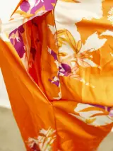 Rae Antwerp elegante soepelvallende oranje damesbroek met bloemenprint – foto 5 – kavel bij De Kringwinkel, Antwerpen