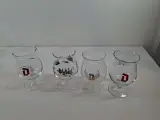 Set van 9 Duvel bierglazen met diverse opdrukken – foto 2 – kavel bij De Kringwinkel, Oudenaarde