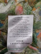 Elegante jurk met tropische en botanische print - Tim Van Steenbergen – foto 10 – kavel bij De Kringwinkel, Gent