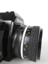 Vintage Nikon EM 35mm spiegelreflexcamera met Nikkor 50mm f/1.8-objectief – foto 5 – kavel bij De Kringwinkel, Heverlee