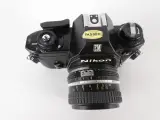 Vintage Nikon EM 35mm spiegelreflexcamera met Nikkor 50mm f/1.8-objectief – foto 7 – kavel bij De Kringwinkel, Heverlee