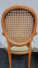 Set van 2 vintage rotan stoelen met armleuning – foto 5 – kavel bij De Kringwinkel, Turnhout