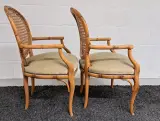 Set van 2 vintage rotan stoelen met armleuning – foto 7 – kavel bij De Kringwinkel, Turnhout