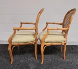 Set van 2 vintage rotan stoelen met armleuning – foto 8 – kavel bij De Kringwinkel, Turnhout