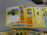 150 Pokémon kaarten in sword en shield blik – foto 2 – kavel bij De Kringwinkel, Diest