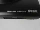 Sega Mega Drive 16-Bit – console met controller, kabels en gamecartridge – foto 5 – kavel bij De Kringwinkel, Heverlee