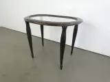 Halfovale salontafel met een houten frame en een glazen blad – kavel bij De Kringwinkel, Heverlee