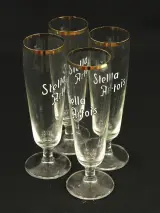 Stella Artois set van vier vintage luxe pilsglazen met goudkleurige rand op voet 1970 – kavel bij De Kringwinkel, Antwerpen