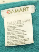 Damart sjaal met subtiele pailletten aan de uiteindes - turquoise – foto 3 – kavel bij De Kringwinkel, Antwerpen