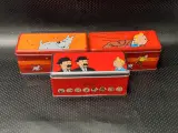 Verzameling van 12 Kuifje blikken en verzamelboxen van Delacre en Lotus - begin jaren 2000 – foto 8 – kavel bij De Kringwinkel, Gent