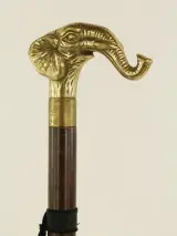 2 Wandelstokken met metalen dierenkoppen – olifant en arend – kavel bij De Kringwinkel, Antwerpen
