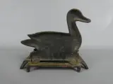 Vintage metalen schoenveger met eend decoratie – foto 3 – kavel bij De Kringwinkel, Diest