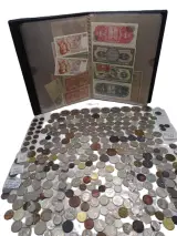 Verzameling oude munten en bankbiljetten in album – kavel bij De Kringwinkel, Oostende