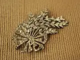 Art-deco .835 zilveren strikbroche met florale motieven & markasiet – foto 4 – kavel bij De Kringwinkel, Antwerpen