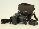 Nikon D100 digitale spiegelreflexcamera met lens en accessoires – kavel bij De Kringwinkel, Antwerpen