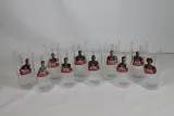Set van 10 glazen met voetbalspelers en Jupiler logo – kavel bij De Kringwinkel, Brecht