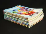 Groot Disney verzamelpakket servies, figuren, dvd’s, boeken & vintage 8mm film – foto 10 – kavel bij De Kringwinkel, Antwerpen