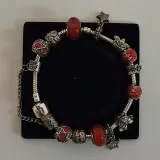 Bedelarmband met zilveren bedels – kavel bij De Kringwinkel, Aalst
