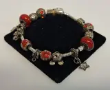 Bedelarmband met zilveren bedels – foto 3 – kavel bij De Kringwinkel, Aalst
