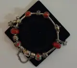 Bedelarmband met zilveren bedels – foto 4 – kavel bij De Kringwinkel, Aalst