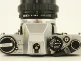 Olympus OM-10 analoge spiegelreflexcamera met 35-70mm lens – foto 7 – kavel bij De Kringwinkel, Antwerpen