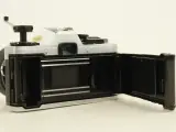 Olympus OM-10 analoge spiegelreflexcamera met 35-70mm lens – foto 8 – kavel bij De Kringwinkel, Antwerpen