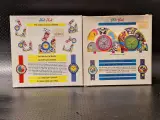 Set van twee vintage Flik Flak kinderwekkers uit 1992 in originele verpakking - Swatch – foto 9 – kavel bij De Kringwinkel, Gent