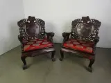 Set van 2 Chinese houten troonstoelen – rijk houtsnijwerk – kavel bij De Kringwinkel, Heverlee