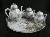 Porseleinen theeservies met decoratieve vogels en bloemen – kavel bij De Kringwinkel, Diest