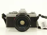 Minolta XG-9 35mm SLR met MD Zoom Rokkor 35-70mm f/3.5 & Hoya UV-filter – kavel bij De Kringwinkel, Antwerpen