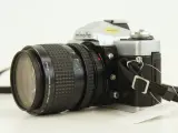 Minolta XG-9 35mm SLR met MD Zoom Rokkor 35-70mm f/3.5 & Hoya UV-filter – foto 3 – kavel bij De Kringwinkel, Antwerpen