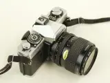 Minolta XG-9 35mm SLR met MD Zoom Rokkor 35-70mm f/3.5 & Hoya UV-filter – foto 4 – kavel bij De Kringwinkel, Antwerpen